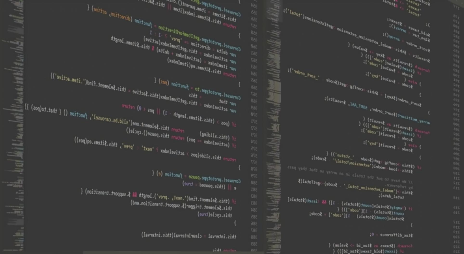 Developer reviewing mobile app code on multiple screens with testing environment