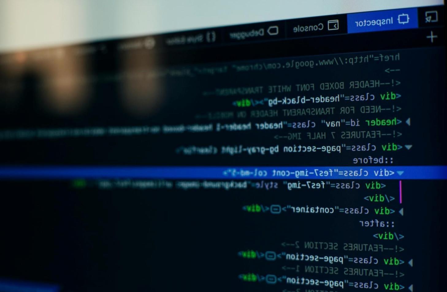 Team collaboration session with developers reviewing mobile application architecture